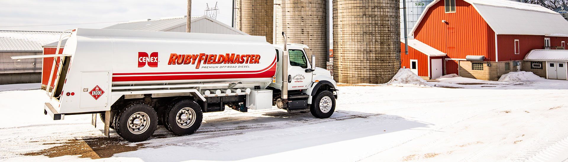 Driver delivering Cenex Ruby FieldMaster to a farm